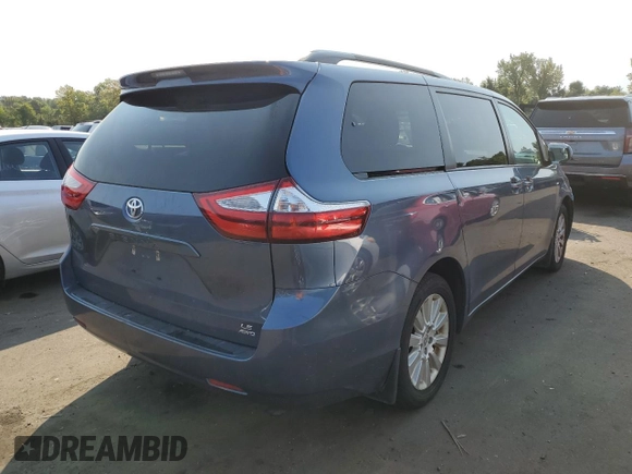 2016 Toyota Sienna LE with VIN 5TDJK3DC2GS133323, listed as a Copart auction lot 70515664 with 106,750 mi miles and Salvage Title. Bid and sale history available at carsss.com. Image 3.