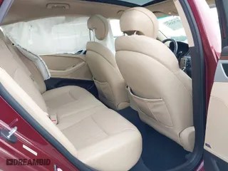 2015 Hyundai Genesis 3.8L with VIN KMHGN4JE8FU036971, listed as a IAAI auction lot 41713292 with 102,009 mi miles. Bid and sale history available at carsss.com. Image 8.
