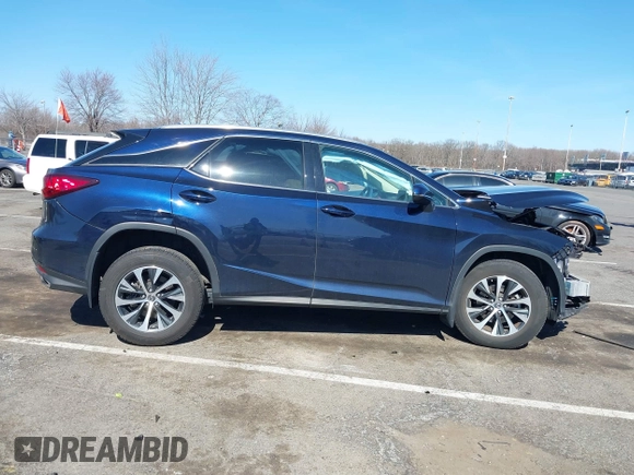 2022 Lexus RX with VIN 2T2HZMDA4NC358746, listed as a IAAI auction lot 41772090 with 26,370 mi miles. Bid and sale history available at carsss.com. Image 13.