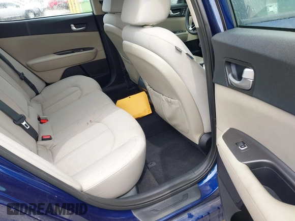 2016 Kia Optima LX with VIN 5XXGT4L34GG083587, listed as a IAAI auction lot 42273240 with 87,286 mi miles and . Bid and sale history available at DreamBid. Image 8.