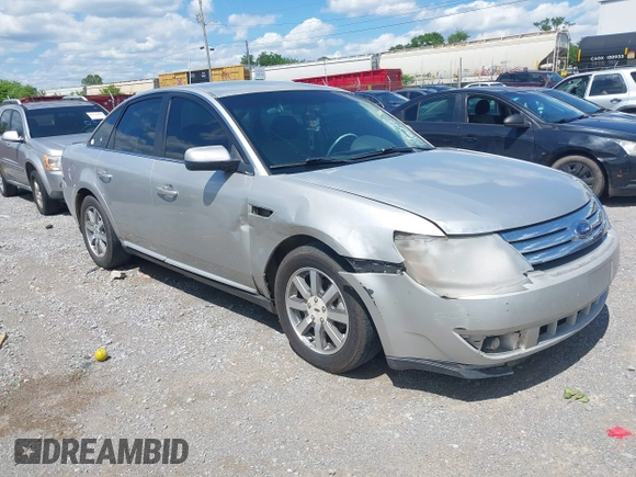 2008 Ford Taurus SEL z VIN 1FAHP24W28G186822, wystawiony jako IAAI lot #42173076 z przebiegiem 243 849 mil mil oraz . Historia ofert i sprzedaży dostępna na DreamBid. Obrazek 1.