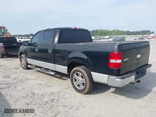 2006 Ford F-150 XLT with VIN 1FTPW12V06FB34895, listed as a IAAI auction lot 42104522 with 149,935 mi miles. Bid and sale history available at carsss.com. Image 3.