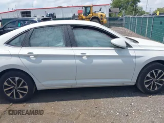 2023 Volkswagen Jetta S with VIN 3VW4M7BU9PM036109, listed as a IAAI auction lot 40129247 with 18,547 mi miles and . Bid and sale history available at DreamBid. Image 13.