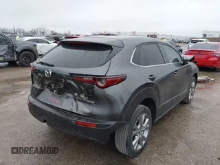 2021 Mazda CX-30 Select with VIN 3MVDMABL9MM272440, listed as a IAAI auction lot 41538691 with 55,069 mi miles and . Bid and sale history available at carsss.com. Image 4.