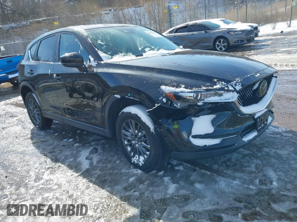 2020 Mazda CX-5 Touring with VIN JM3KFBCM5L0866189, listed as a IAAI auction lot 41829901 with 31,627 mi miles. Bid and sale history available at carsss.com. Image 1.