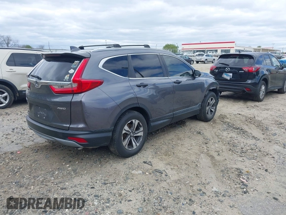 2019 Honda CR-V LX with VIN 2HKRW6H30KH208392, listed as a IAAI auction lot 41795592 with 74,771 mi miles. Bid and sale history available at carsss.com. Image 4.