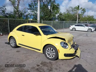 2015 Volkswagen Beetle Fleet Edition with VIN 3VWF17AT6FM641987, listed as a IAAI auction lot 41964021 with 87,818 mi miles and . Bid and sale history available at DreamBid. Image 1.