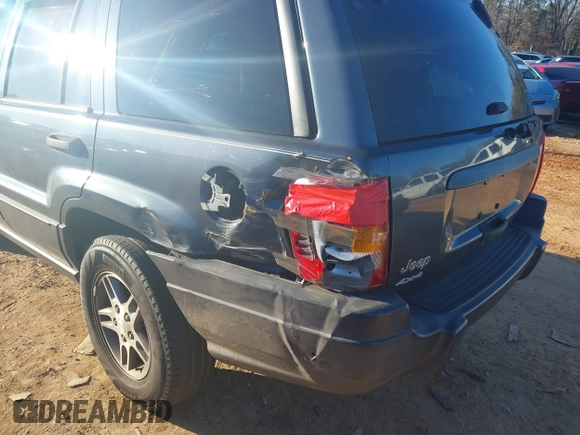 2004 Jeep Grand Cherokee Laredo z VIN 1J4GW48S24C159370, wystawiony jako IAAI lot #41296094 z przebiegiem 138 296 mil mil oraz . Historia ofert i sprzedaży dostępna na DreamBid. Obrazek 6.