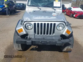 2006 Jeep Wrangler X with VIN 1J4FA39S16P787614, listed as a IAAI auction lot 41992315 with 61,788 mi miles. Bid and sale history available at carsss.com. Image 13.