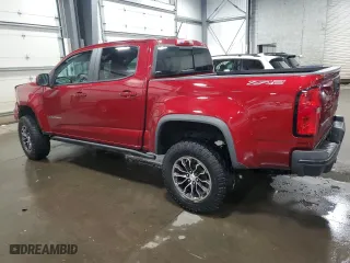 2021 Chevrolet Colorado 4WD ZR2 with VIN 1GCGTEEN7M1111894, listed as a Copart auction lot 85169404 with 56,965 mi miles and Salvage Title. Bid and sale history available at carsss.com. Image 2.