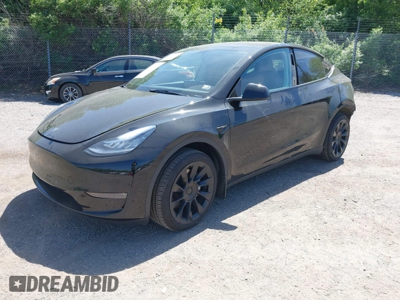 2023 Tesla Model Y Long Range with VIN 7SAYGDEE0PA111430, listed as a IAAI auction lot 42156924 with 35,950 mi miles and . Bid and sale history available at DreamBid. Image 20.