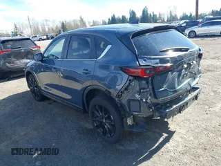 2023 Mazda CX-5 2.5 S Carbon Edition with VIN JM3KFBCM8P0134757, listed as a IAAI auction lot 41893648 with 9,587 mi miles. Bid and sale history available at carsss.com. Image 3.