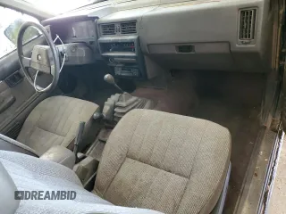 1986 Nissan Hardbody E z VIN 1N6ND16Y7GC413942, wystawiony jako Copart lot #57677605 z przebiegiem 126 183 mil mil oraz Tytuł czysty. Historia ofert i sprzedaży dostępna na DreamBid. Obrazek 8.