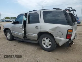 2004 GMC Yukon SLT with VIN 1GKEK13Z74J295635, listed as a Copart auction lot 70412114 with 262,062 mi miles and Salvage Title. Bid and sale history available at carsss.com. Image 2.