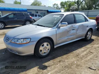 2002 Honda Accord EX z VIN 1HGCG16592A018822, wystawiony jako Copart lot #53970985 z przebiegiem 158 344 mil mil oraz Szkoda całkowita • Salvage title. Historia ofert i sprzedaży dostępna na DreamBid. Obrazek 1.