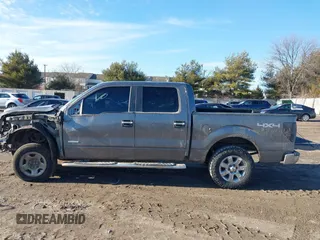 2013 Ford F-150 XL with VIN 1FTFW1ET6DFD65707, listed as a IAAI auction lot 41592995 with 215,848 mi miles and . Bid and sale history available at DreamBid. Image 14.