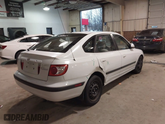 2005 Hyundai Elantra GLS with VIN KMHDN56D65U171907, listed as a IAAI auction lot 41051694 with 103,899 mi miles and . Bid and sale history available at DreamBid. Image 4.