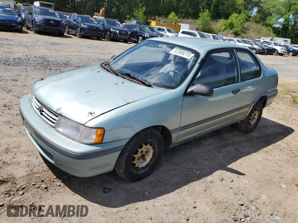 1992 Toyota Tercel z VIN JT2EL43B1N0209927, wystawiony jako Copart lot #57595275 z przebiegiem 87 577 mil mil oraz Tytuł czysty. Historia ofert i sprzedaży dostępna na DreamBid. Obrazek 1.