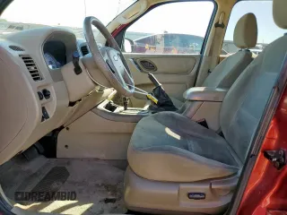 2005 Ford Escape XLT с VIN 1FMYU93185KE31449, выставлен на аукционе Copart как лот 57763225 с пробегом 249 819 миль миль и Списание • Salvage title. История ставок и продаж доступна на DreamBid. Изображение 7.