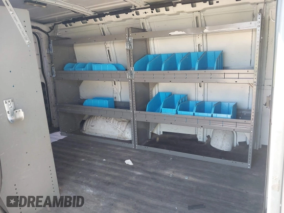 2015 Chevrolet Express Cargo with VIN 1GCWGFCF6F1261368, listed as a IAAI auction lot 42158324 with 196,406 mi miles. Bid and sale history available at carsss.com. Image 8.