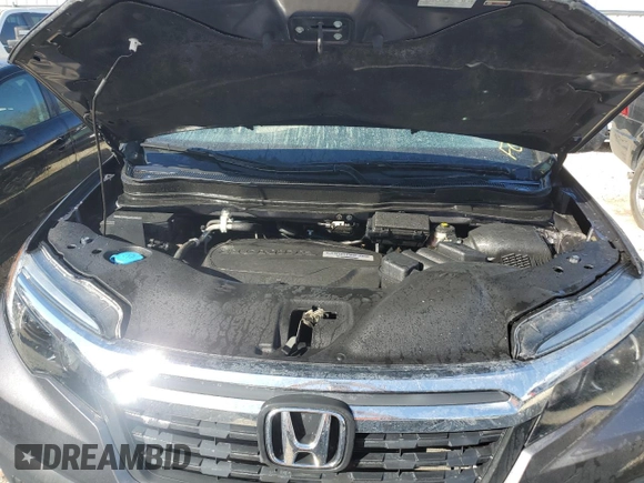 2018 Honda Ridgeline RTL with VIN 5FPYK3F54JB015872, listed as a Copart auction lot 77525614 with Not provided miles and Salvage title. Bid and sale history available at DreamBid. Image 12.