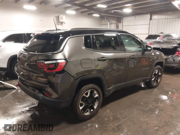 2018 Jeep Compass Trailhawk with VIN 3C4NJDDB4JT210451, listed as a IAAI auction lot 41239258 with 90,552 mi miles and . Bid and sale history available at carsss.com. Image 4.