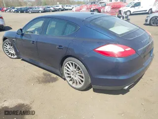 2011 Porsche Panamera with VIN WP0AA2A78BL013850, listed as a IAAI auction lot 42095245 with 104,730 mi miles. Bid and sale history available at carsss.com. Image 3.