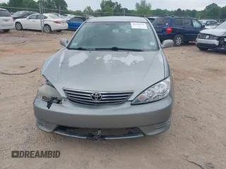 2005 Toyota Camry STD z VIN 4T1BE32K05U555388, wystawiony jako IAAI lot #42119726 z przebiegiem 148 376 mil mil oraz . Historia ofert i sprzedaży dostępna na DreamBid. Obrazek 12.