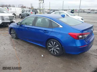 2022 Honda Civic Sedan EX with VIN 2HGFE1F74NH325843, listed as a IAAI auction lot 41116731 with 69,429 mi miles. Bid and sale history available at carsss.com. Image 3.