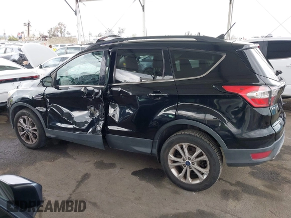 2018 Ford Escape SEL with VIN 1FMCU0HD6JUA86266, listed as a IAAI auction lot 42031613 with 72,798 mi miles and . Bid and sale history available at carsss.com. Image 14.