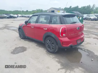 2014 MINI Countryman S z VIN WMWZC5C50EWP39566, wystawiony jako IAAI lot #42456424 z przebiegiem 99 518 mil mil oraz . Historia ofert i sprzedaży dostępna na DreamBid. Obrazek 3.