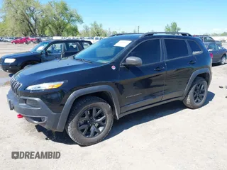 2018 Jeep Cherokee Trailhawk Leather Plus with VIN 1C4PJMBXXJD572667, listed as a IAAI auction lot 42216477 with 85,890 mi miles and . Bid and sale history available at DreamBid. Image 2.