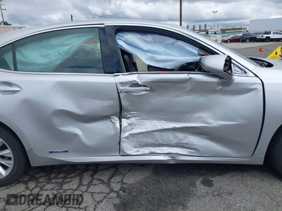 2015 Lexus ES 300h with VIN JTHBW1GG1F2084938, listed as a IAAI auction lot 41761844 with 69,854 mi miles and . Bid and sale history available at DreamBid. Image 6.