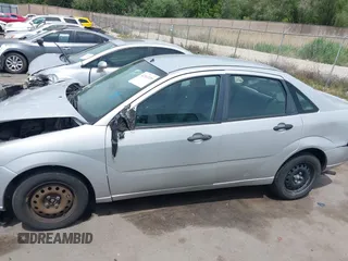 2006 Ford Focus S with VIN 1FAHP34N66W204321, listed as a IAAI auction lot 42363339 with 223,278 mi miles and . Bid and sale history available at DreamBid. Image 14.
