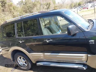 2002 Mitsubishi Montero XLS z VIN JA4MW31R52J070132, wystawiony jako IAAI lot #41782522 z przebiegiem 92 575 mil mil oraz . Historia ofert i sprzedaży dostępna na DreamBid. Obrazek 13.