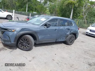 2024 Mazda CX-50 S Select z VIN 7MMVABAMXRN191832, wystawiony jako IAAI lot #41946922 z przebiegiem 15 850 mil mil oraz . Historia ofert i sprzedaży dostępna na DreamBid. Obrazek 15.