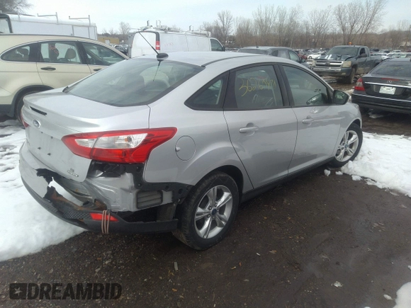 2013 Ford Focus SE with VIN 1FADP3F25DL271105, listed as a IAAI auction lot 36260870 with 122,592 mi miles. Bid and sale history available at carsss.com. Image 4.