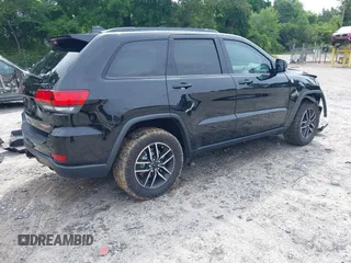 2020 Jeep Grand Cherokee Trailhawk with VIN 1C4RJFLG4LC387459, listed as a IAAI auction lot 42373820 with 55,492 mi miles and . Bid and sale history available at DreamBid. Image 4.