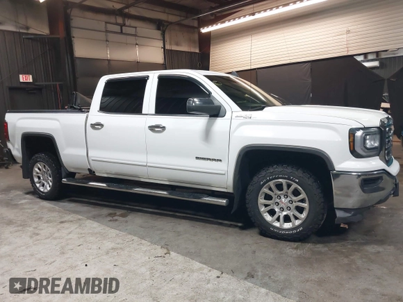 2018 GMC Sierra 1500 SLE z VIN 3GTU2MEC5JG104843, wystawiony jako IAAI lot #42447744 z przebiegiem 136 874 mil mil oraz . Historia ofert i sprzedaży dostępna na DreamBid. Obrazek 13.