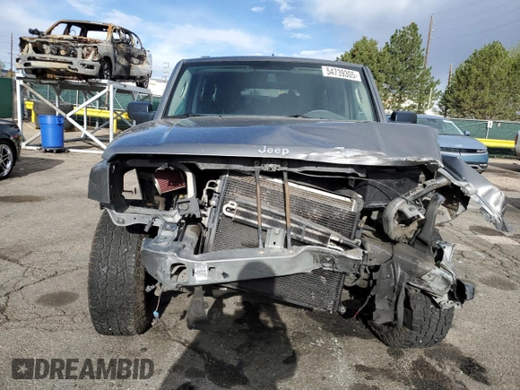 2008 Jeep Commander Sport with VIN 1J8HG48K18C184699, listed as a Copart auction lot 54739305 with 185,950 mi miles and Salvage title. Bid and sale history available at DreamBid. Image 5.
