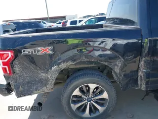 2019 Ford F-150 XL with VIN 1FTEW1CP1KKE90717, listed as a IAAI auction lot 41849276 with 113,241 mi miles and . Bid and sale history available at DreamBid. Image 12.