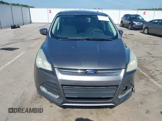 2013 Ford Escape SE with VIN 1FMCU0G92DUD71645, listed as a IAAI auction lot 42638354 with 112,128 mi miles and . Bid and sale history available at DreamBid. Image 12.
