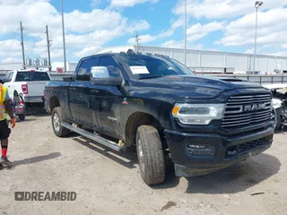 2023 Ram 2500 Laramie with VIN 3C6UR5FL2PG567670, listed as a IAAI auction lot 42231743 with 108,957 mi miles and . Bid and sale history available at DreamBid. Image 1.