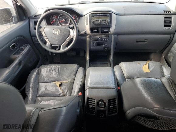 2007 Honda Pilot EX-L with VIN 5FNYF28557B037344, listed as a Copart auction lot 82451984 with 283,504 mi miles and Salvage Title. Bid and sale history available at carsss.com. Image 8.