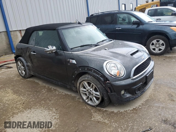2014 MINI Convertible S with VIN WMWZP3C53ET298154, listed as a Copart auction lot 53971615 with 85,499 mi miles and Salvage title. Bid and sale history available at DreamBid. Image 4.