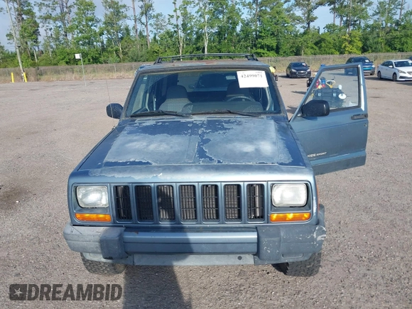 1999 Jeep Cherokee Sport with VIN 1J4FT68S9XL581835, listed as a IAAI auction lot 42499071 with 203,782 mi miles and . Bid and sale history available at DreamBid. Image 6.