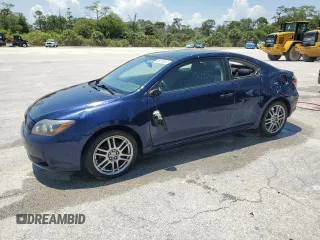 2010 Scion tC z VIN JTKDE3B7XA0306230, wystawiony jako Copart lot #76171614 z przebiegiem 159 457 mil mil oraz Szkoda całkowita • Salvage title. Historia ofert i sprzedaży dostępna na DreamBid. Obrazek 1.