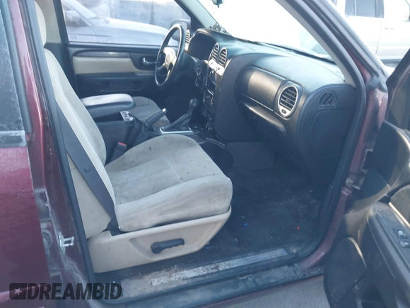 2005 GMC Envoy SLT with VIN 1GKDT13S452115924, listed as a IAAI auction lot 41443704 with 215,402 mi miles. Bid and sale history available at carsss.com. Image 5.