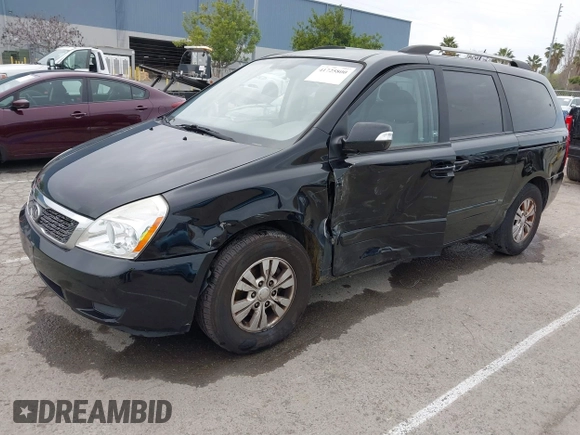 2012 Kia Sedona LX with VIN KNDMG4C78C6502141, listed as a IAAI auction lot 41725800 with 153,789 mi miles and . Bid and sale history available at carsss.com. Image 2.