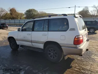 1999 Toyota Land Cruiser with VIN JT3HT05J8X0049750, listed as a Copart auction lot 77547144 with 168,435 mi miles and Salvage Title. Bid and sale history available at carsss.com. Image 2.